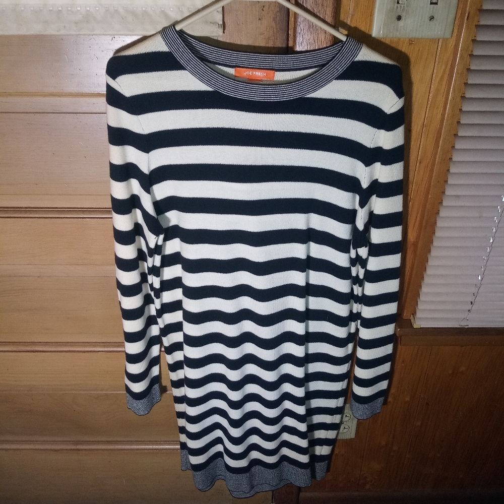 Black and white striped sweater dress.